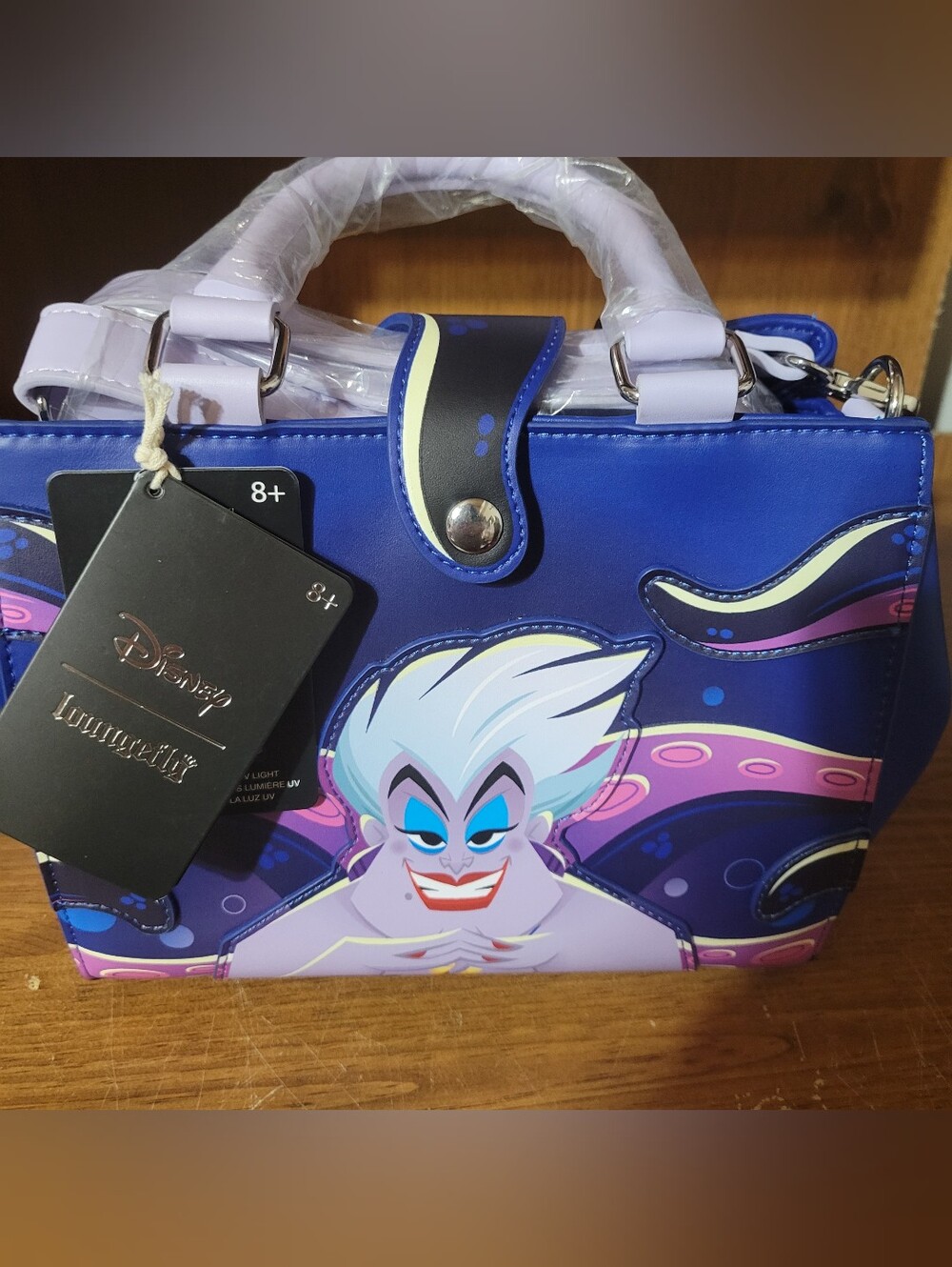 Loungefly Plotting Ursula the little mermaid Gitd crossbody.